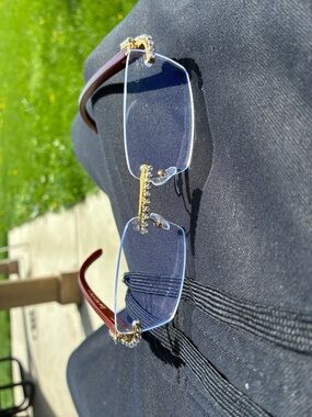 Cartier Rimless Blue Tint Lenses with Gold and Brown Accents